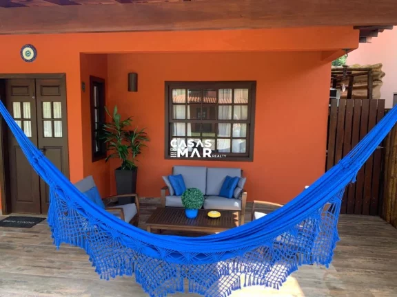 Imagem Excelente Casa em Condomínio, a poucos pasos da praia, Búzios-RJ: 4 Quartos, 3 Suítes, 2 Vagas de Garagem