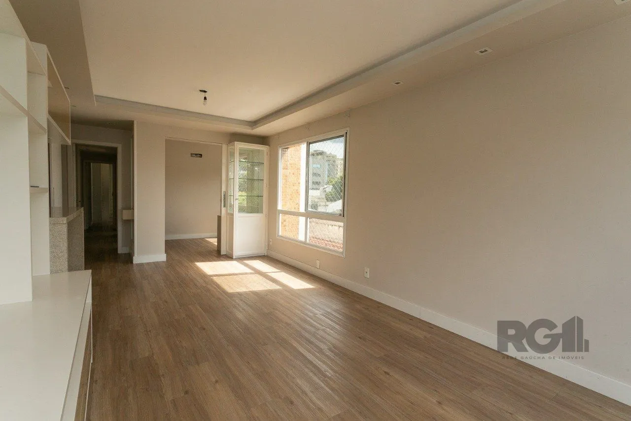 Imagem Apartamento semimobiliado e decorado no bairro Auxiliadora, com 91 m²
