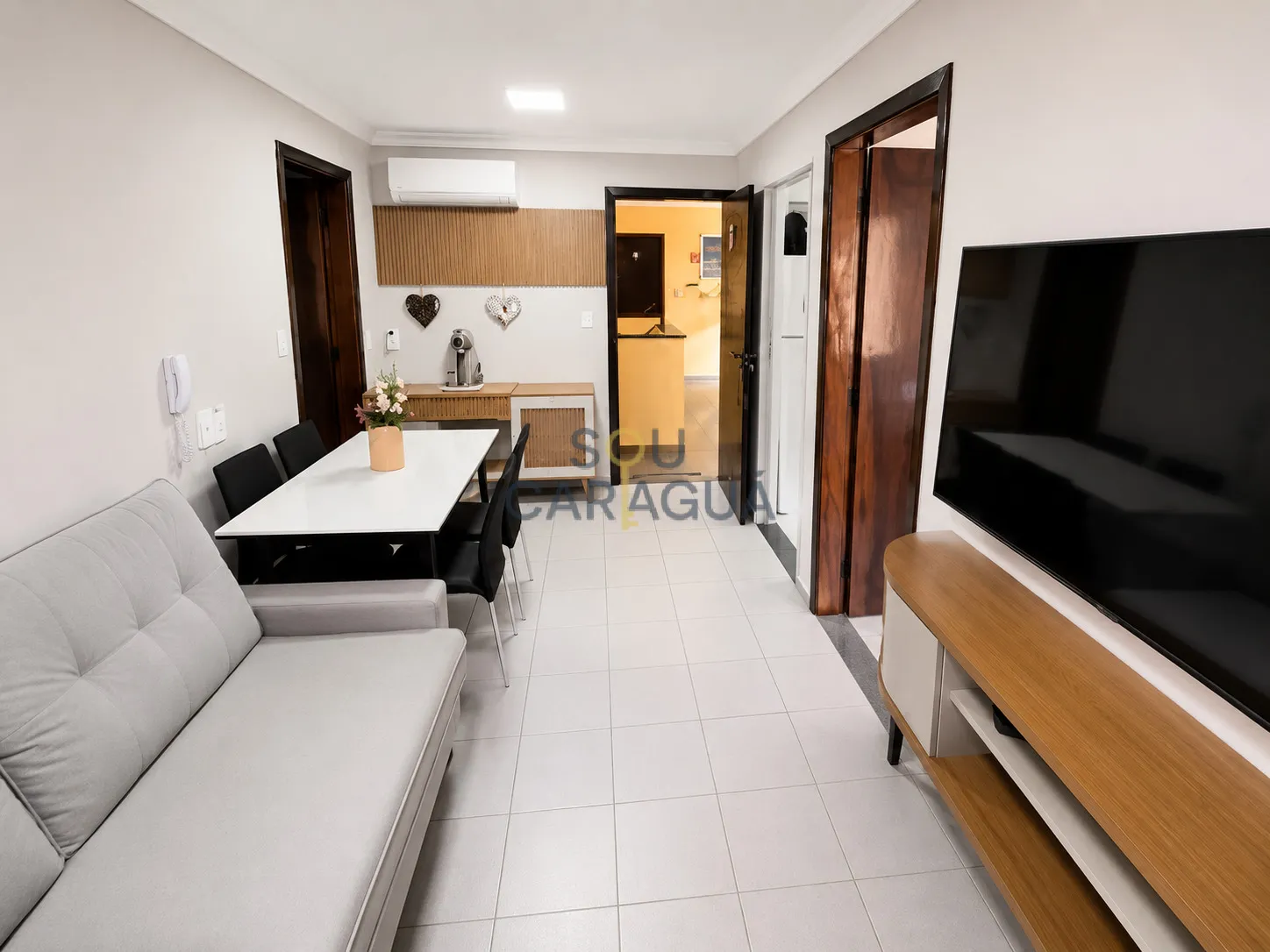 Imagem Apartamento com 2 quartos e piscina a venda na Martim de Sá em Caraguá