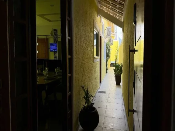 Imagem Casa com 3 dormitórios à venda, 157 m² por R$ 1.249.000 - Caiçara - Praia Grande/SP