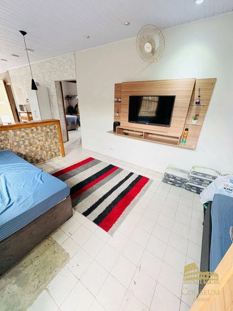 Imagem Casa com 3 dormitórios à venda por R$ 770.000,00 - Jardim Anhangüera - Praia Grande/SP