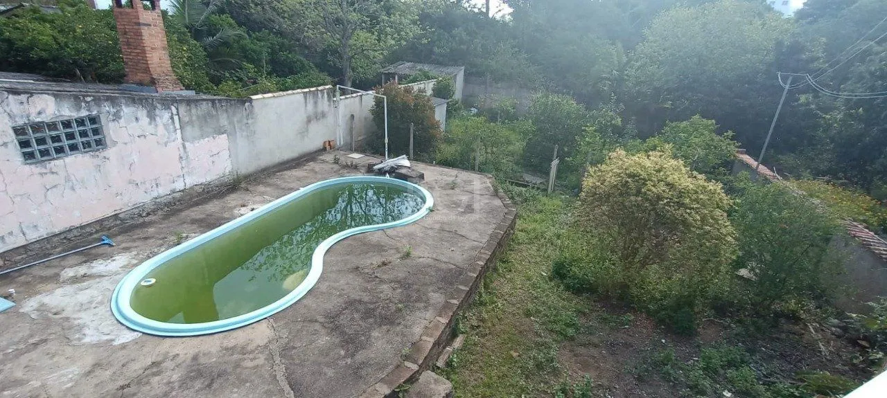 Imagem Casa para Venda - 250m², 3 dormitórios, sendo 1 suites, 2 vagas - Vila Nova, Porto Alegre