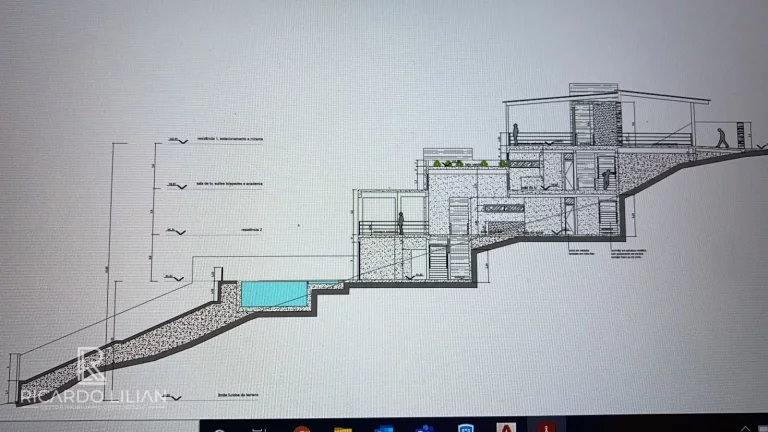 Imagem Terreno em condomínio com obra iniciada e projeto para casa com 600m² de area util.