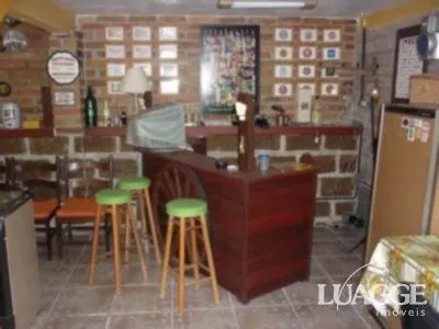 Imagem casa com 4 dormitórios, sendo uma suíte , e 530 area privativa