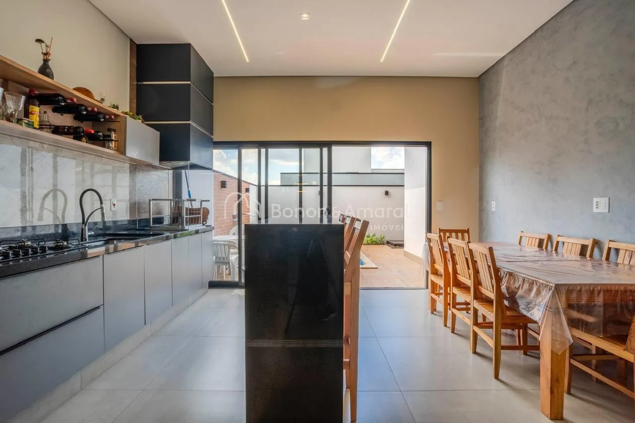 Imagem Casa à venda em condomínio, em Paulínia, 3 suites, closet, lavabo, escritório, 4 vagas, aquecimento solar, piscina com cascata,fino acabamento.