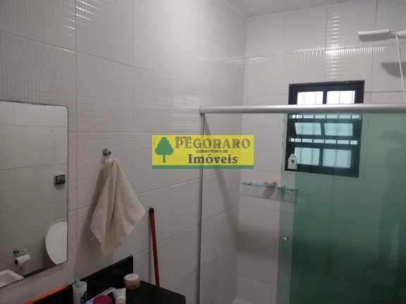 Imagem Casa à venda em Caraguatatuba-SP, bairro Rio do Ouro: 2 quartos, 2 salas, 2 banheiros, 2 vagas de garagem, 127m² - com piscina e churrasqueira!
