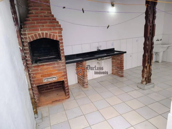 Imagem Casa com 2 dormitórios à venda por R$ 530.000,00 - Tupi - Praia Grande/SP