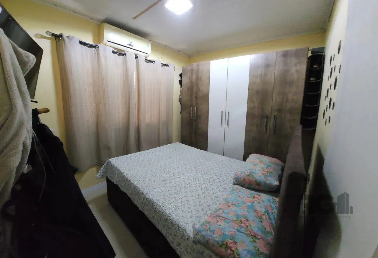 Imagem Casa com 4 quartos, 1 suíte, 7 vagas - 97,32m² no bairro Jardim Carvalho, Poa/RS