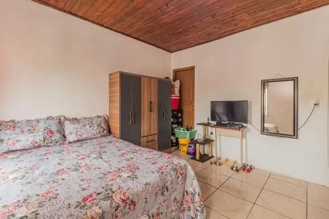 Imagem Casa 2 dorms à venda Avenida Outeiro, Coronel Aparício Borges - Porto Alegre