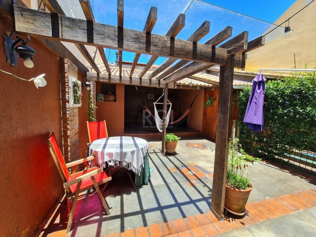 Imagem Casa para Venda - 182m², 3 dormitórios, sendo 3 suites, 2 vagas - Guarujá/ Portal do Guarujá