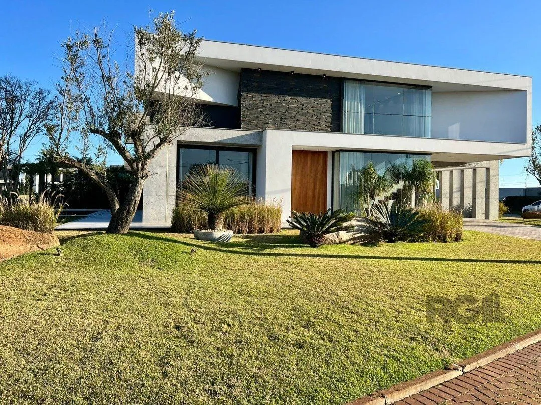 Imagem Casa de Condomínio em Atlântida Sul