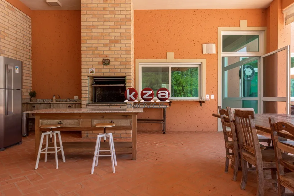 Imagem Luxuosa mansão de alto padrão a venda no Condomínio Terras de São José em Itu- SP, com 5 suítes, amplo gourmet com piscina e 1.500m² de área.