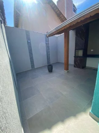 Imagem Casa com 2 dormitórios à venda, 88 m² por R$ 620.000,00 - Aviação - Praia Grande/SP
