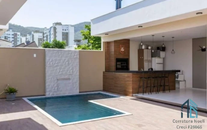 Imagem Casa térrea a venda, Semi mobiliada, 03 quartos c/suíte espaço gourmet, Pedra Branca em Palhoça SC