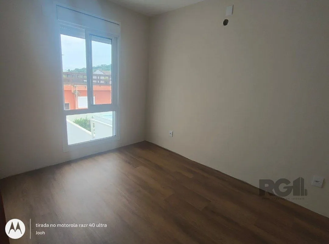 Imagem Casa em Condomínio fechado com 3 dormitórios no bairro Vila Nova em Porto Alegre, RS