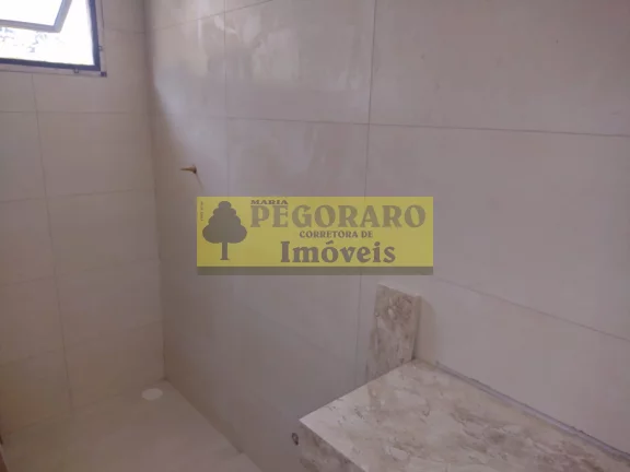 Imagem Sobrado à venda em Caraguatatuba-SP: 2 quartos, 2 suítes, 3 banheiros, 75m² no bairro Cidade Jardim!