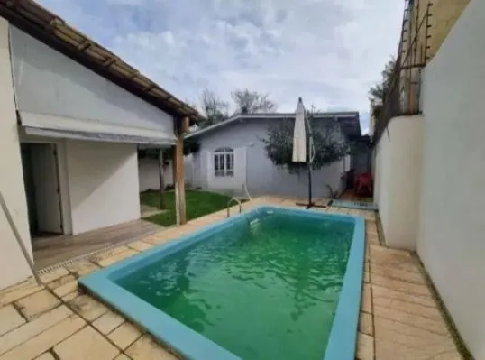 Imagem Casa 3 Dormitórios com Piscina à Venda no Guarujá - Zona Sul de Porto Alegre