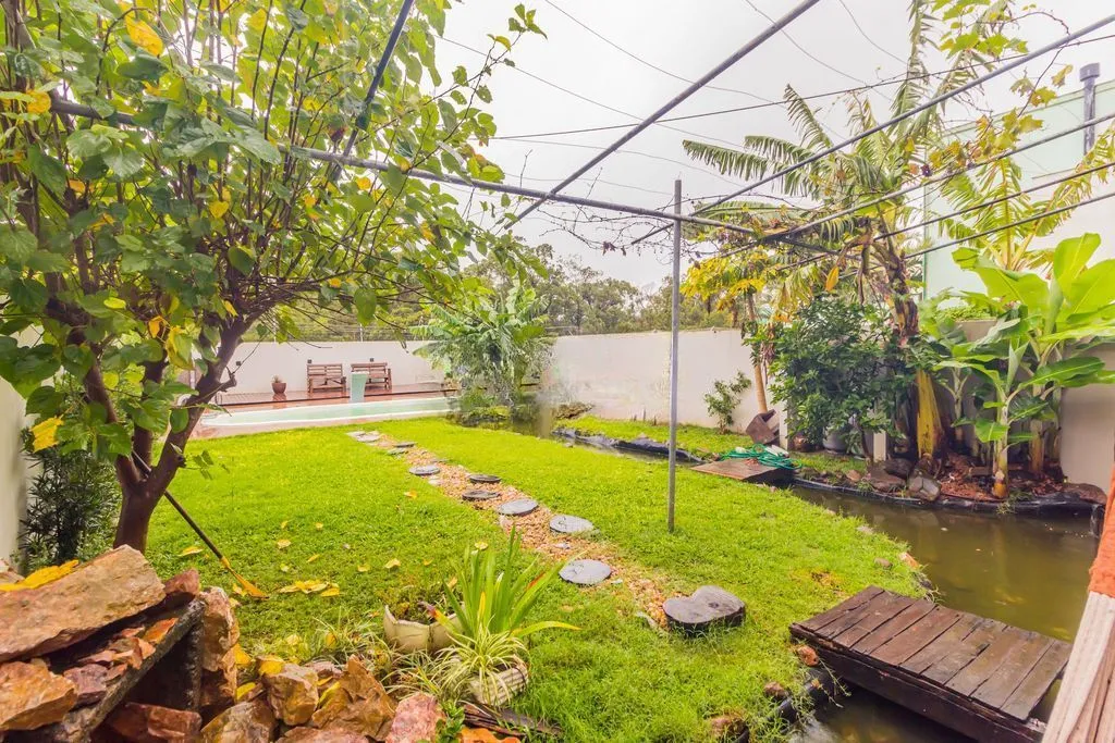 Imagem Casa em Condomínio 3 dorms à venda Avenida Juca Batista, Hípica - Porto Alegre