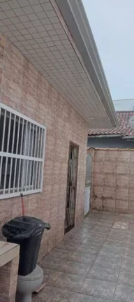 Imagem Casa com 2 dormitórios à venda por R$ 650.000 - Ocian - Praia Grande/SP