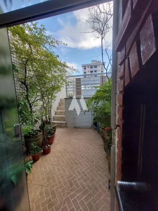 Imagem Casa triplex com piscina á venda em Santos