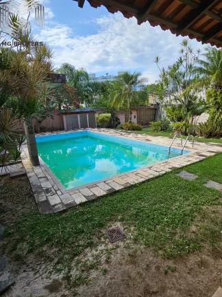 Imagem Casa de luxo em condomínio no Recreio dos Bandeirantes, Rio de Janeiro - 4 quartos, 4 suítes, 4 salas, 6 banheiros, 4 vagas, 400m².