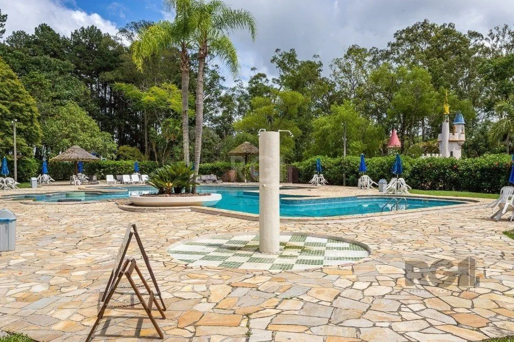 Imagem Casa com 4 quartos, suíte, churrasqueira, vaga de garagem, no bairro Elsa, Viamão/RS