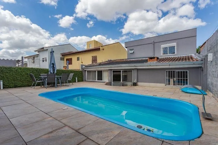 Imagem Casa térrea com 3 dormitórios, espaço gourmet e 3 vagas.
