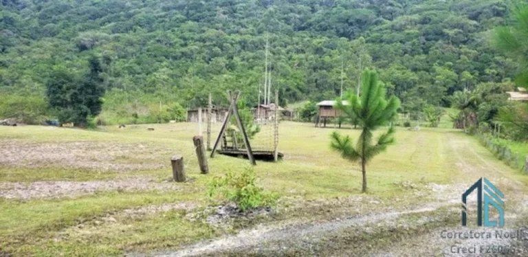Imagem Sítio plana, 24.200 mil m², lagoa c/ peixes, área gourmet, fibra ótica, em ITAJAÍ SC