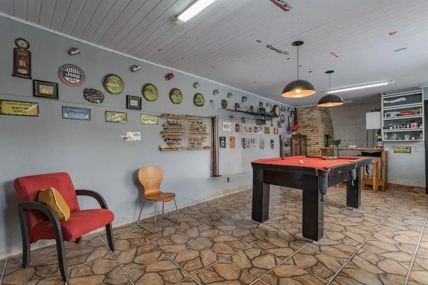 Imagem Casa térrea com 3 dormitórios, espaço gourmet e 3 vagas.