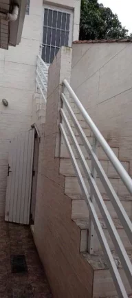 Imagem Casa com 2 dormitórios à venda por R$ 650.000 - Ocian - Praia Grande/SP