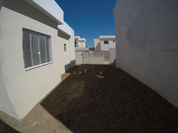 Imagem Casa a Venda em santa mônica Guarapari-ES Casa com 3 dormitório sendo uma suite, quintal, banheiro social, social e garagem