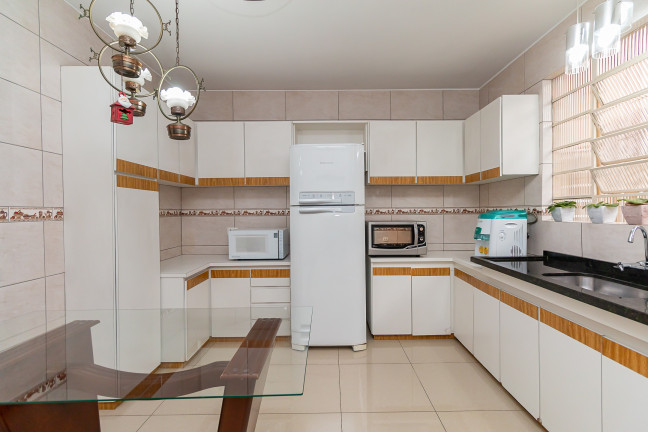 Imagem Casa com 3 Quartos à Venda, 182 m² em Bacacheri - Curitiba