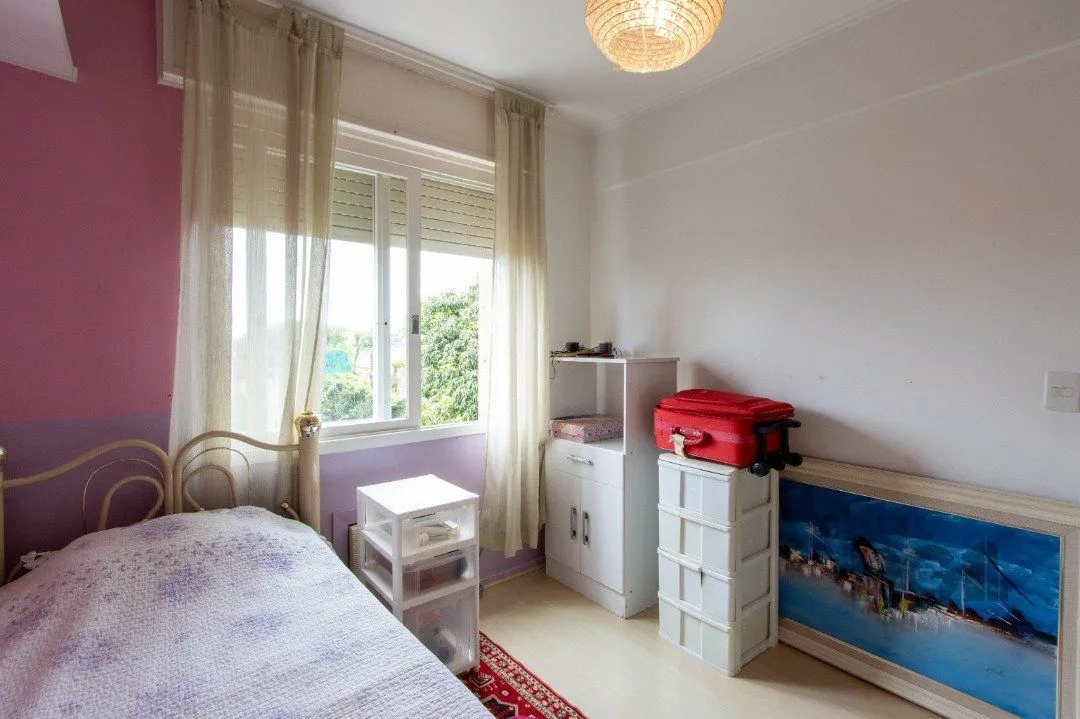 Imagem Apartamento com 73m², 2 dormitórios, área de serviço separada, living 2 ambientes , vaga de garagem escriturada e coberta.