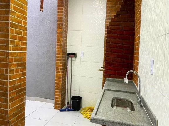 Imagem Casa com 2 dormitórios à venda, 130 m² por R$ 400.000 - Caiçara - Praia Grande/SP