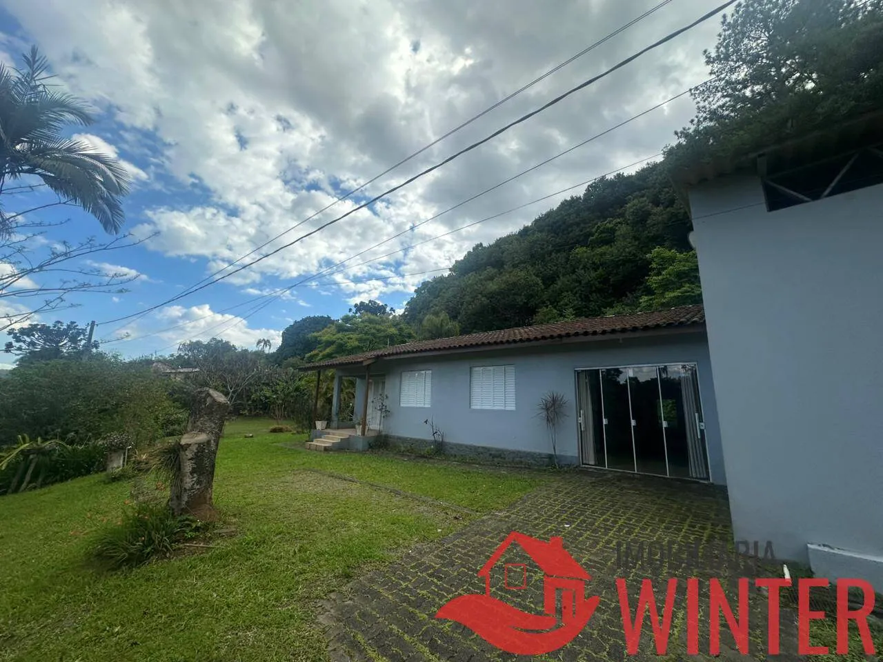 Imagem Casa com 4 dormitórios e galpão no Arroio Feliz.