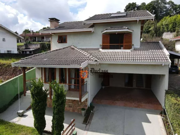 Foto do imóvel Casa com 3 dormitórios à venda, 285 m² por R$ 1.250.000,00 - Jardim Toriba - Campos do Jordão/SP