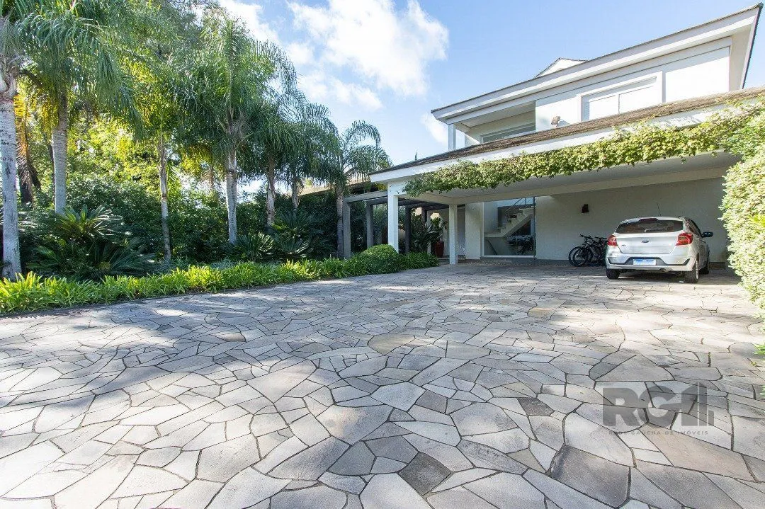 Imagem Casa no Condomínio Las Rocas, vista para o Guaíba, com 5 suítes