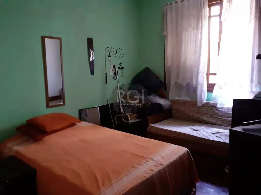 Imagem Casa para Venda - 120m², 3 dormitórios, 1 vaga - Santa Tereza