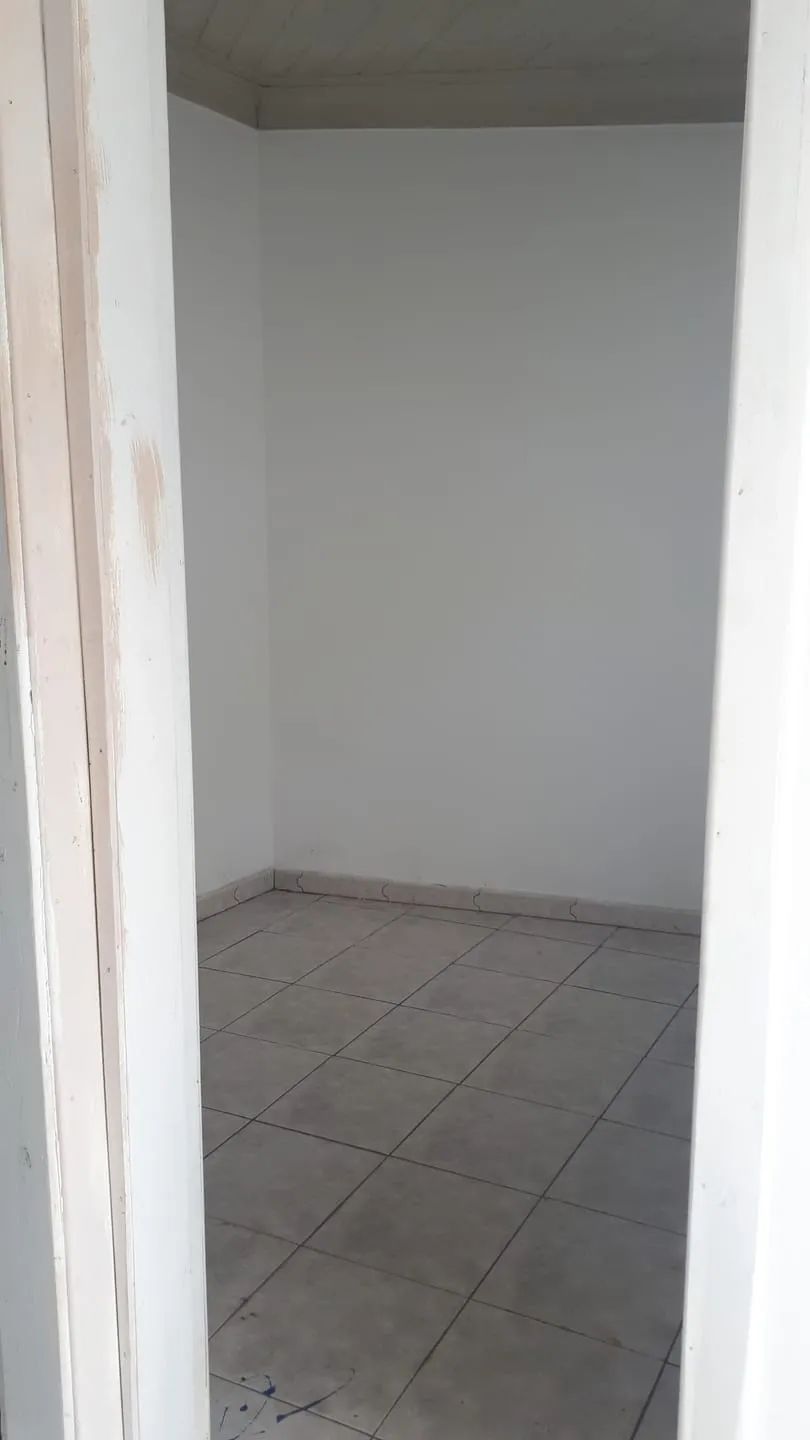 Imagem Casa Comercial no Centro com 2 Dormitórios, Edícula, Acessibilidade, Vaga de Garagem e Ideal para Consultório