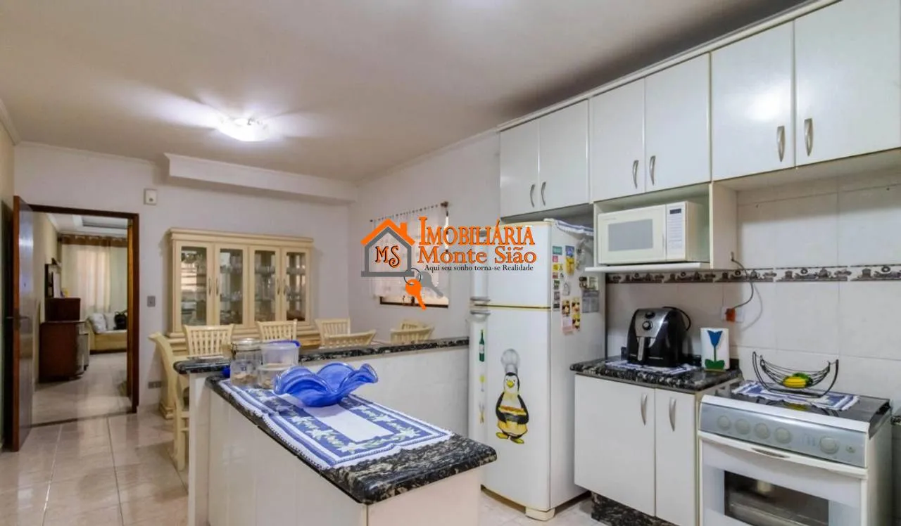 Imagem Sobrado com 4 dormitórios à venda, 135 m² por R$ 750.000 - Ponte Grande - Guarulhos/SP