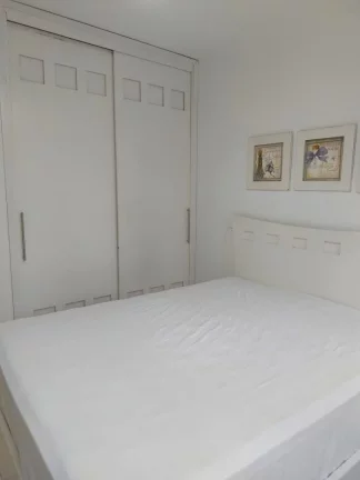 Imagem Apartamento com 4 dormitórios à venda, 113 m² por R$ 660.000,00 - Praia Pitangueiras - Guarujá/SP