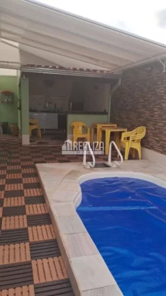 Imagem Casa de 3 quartos com piscina aquecida e energia fotovoltaica no Condomínio Vanice Andrade, no bairro Vila Arquelau.