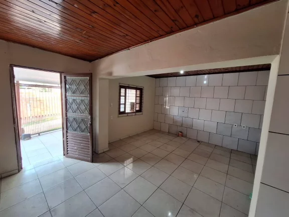 Imagem Casa com 91m², dois dormitórios, garagem, Lomba Tarumã, Viamão/RS.