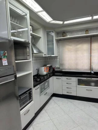 Imagem Sobrado com 3 dormitórios à venda, 195 m² por R$ 1.115.000 - Vila Camilópolis - Santo André/SP