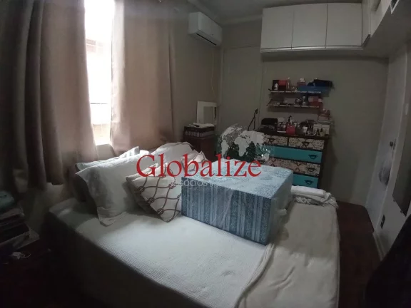 Imagem Casa em Vila à venda com 2 quartos, 2 banheiros, churrasqueira na Vila Mathias em Santos por R$426.000,00
