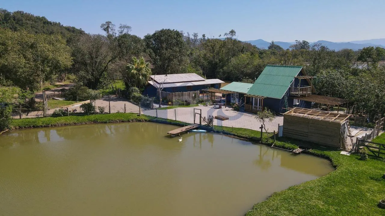 Foto do imóvel Sitio com chale e casa de alvenaria em Vila Sao Joao, Torres