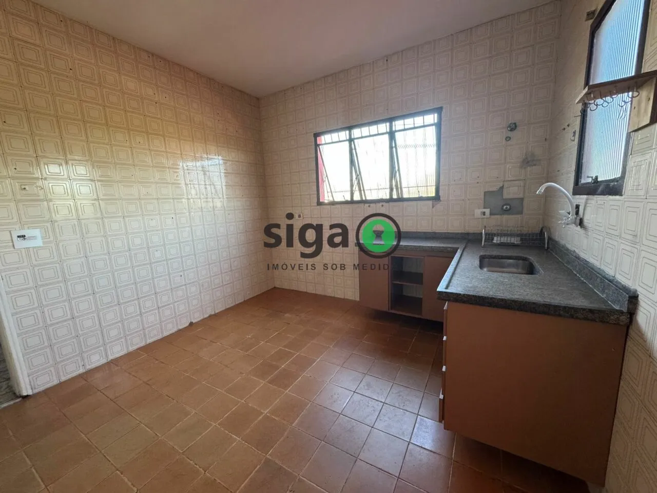 Imagem Sobrado com 2 dormitórios à venda para moradia ou comércio