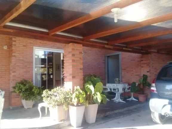 Imagem Excelente Casa com 350m², Condomínio Fechado, situado em Viamão.