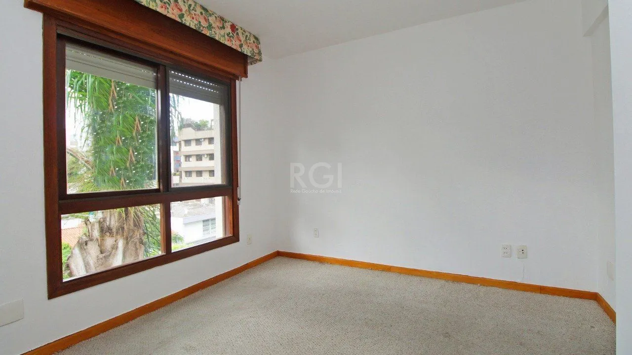 Imagem Apartamento de dois dormitórios e uma vaga de garagem na Rua Marcelo Gama, bairro Auxiliadora em Porto Alegre.
