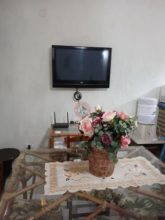 Imagem CASA A VENDA DENTRO DE CONDOMÍNIO EM FRENTE A PRAIA, COM 2 DORMITÓRIOS,VARANDA, JARDIM, CHURRASQUEIRA E 2 VAGAS PARA CARRO